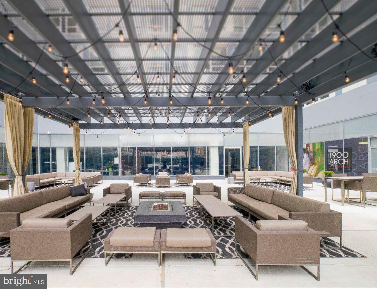 1900-20 Arch Street, Unit 106 Philadelphia, PA 19103 - Photo 13 of 28 a living room with furniture