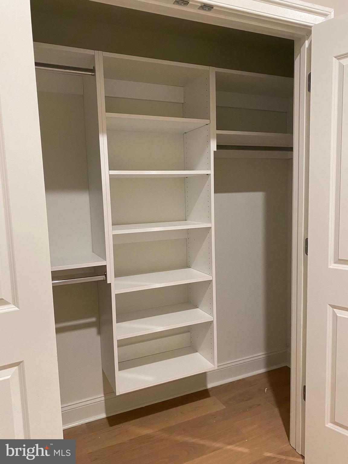 1900-20 Arch Street, Unit 106 Philadelphia, PA 19103 - Photo 7 of 28 a view of walk in closet with empty racks
