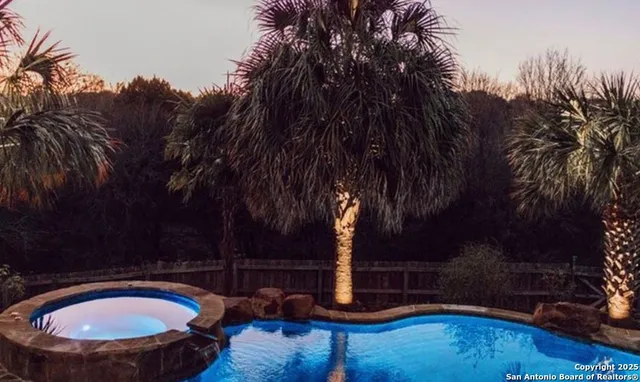 a view of swimming pool having outdoor seating