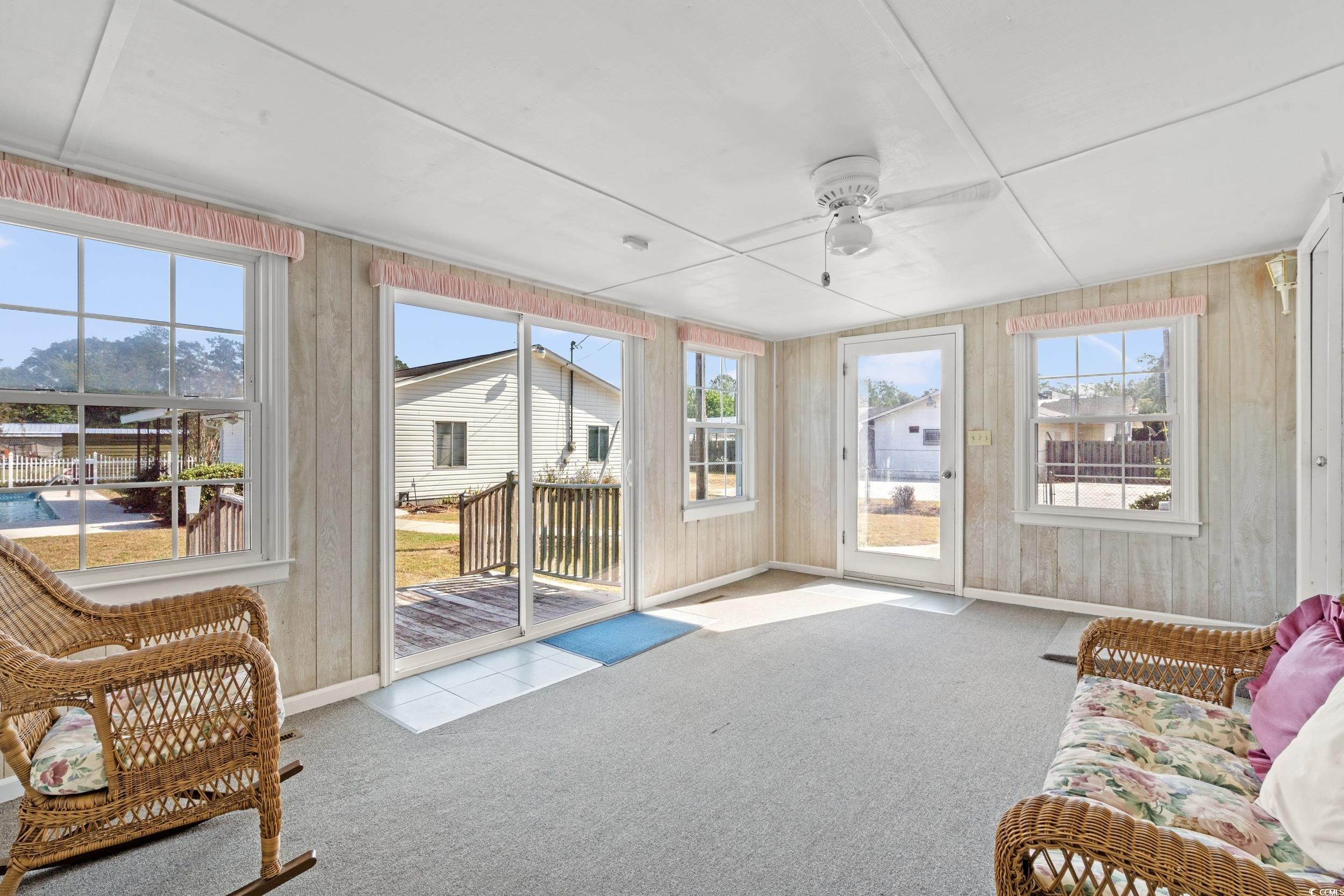 4422 Grady Road Mullins, SC 29574 - Photo 16 of 28 Sunroom featuring a ceiling fan