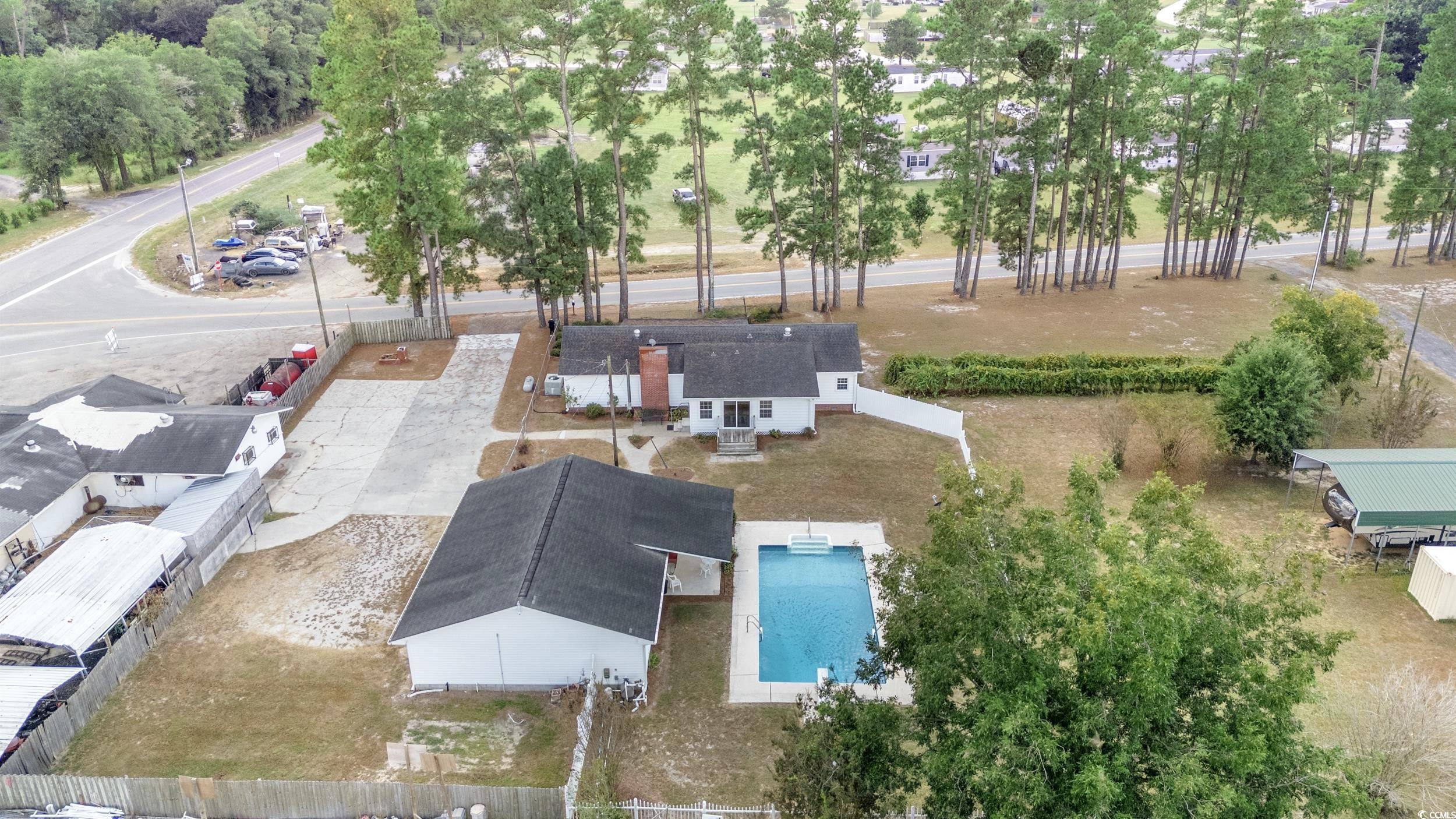 4422 Grady Road Mullins, SC 29574 - Photo 24 of 28 Bird's eye view of a pool area