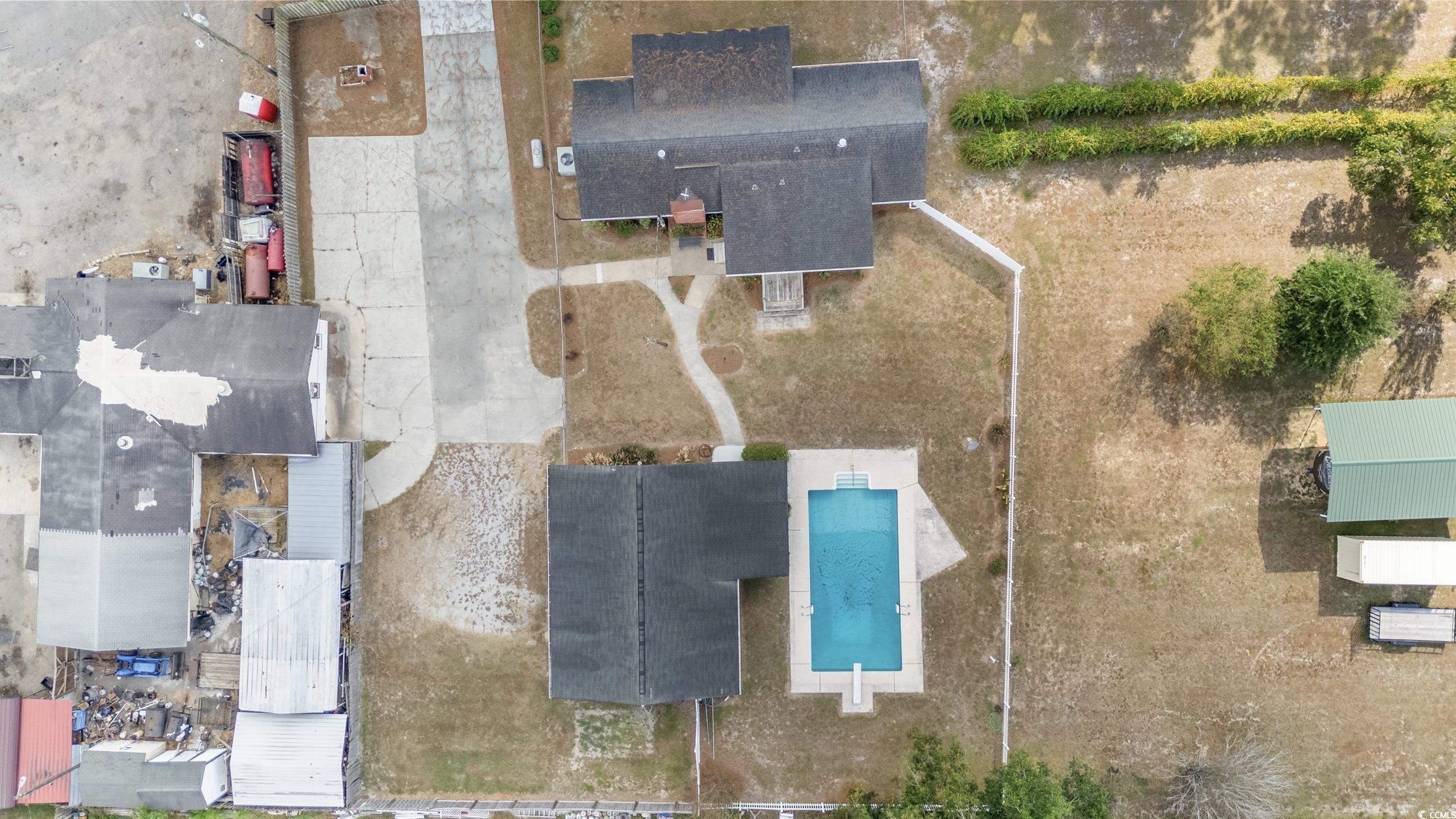 4422 Grady Road Mullins, SC 29574 - Photo 25 of 28 Aerial view of a pool