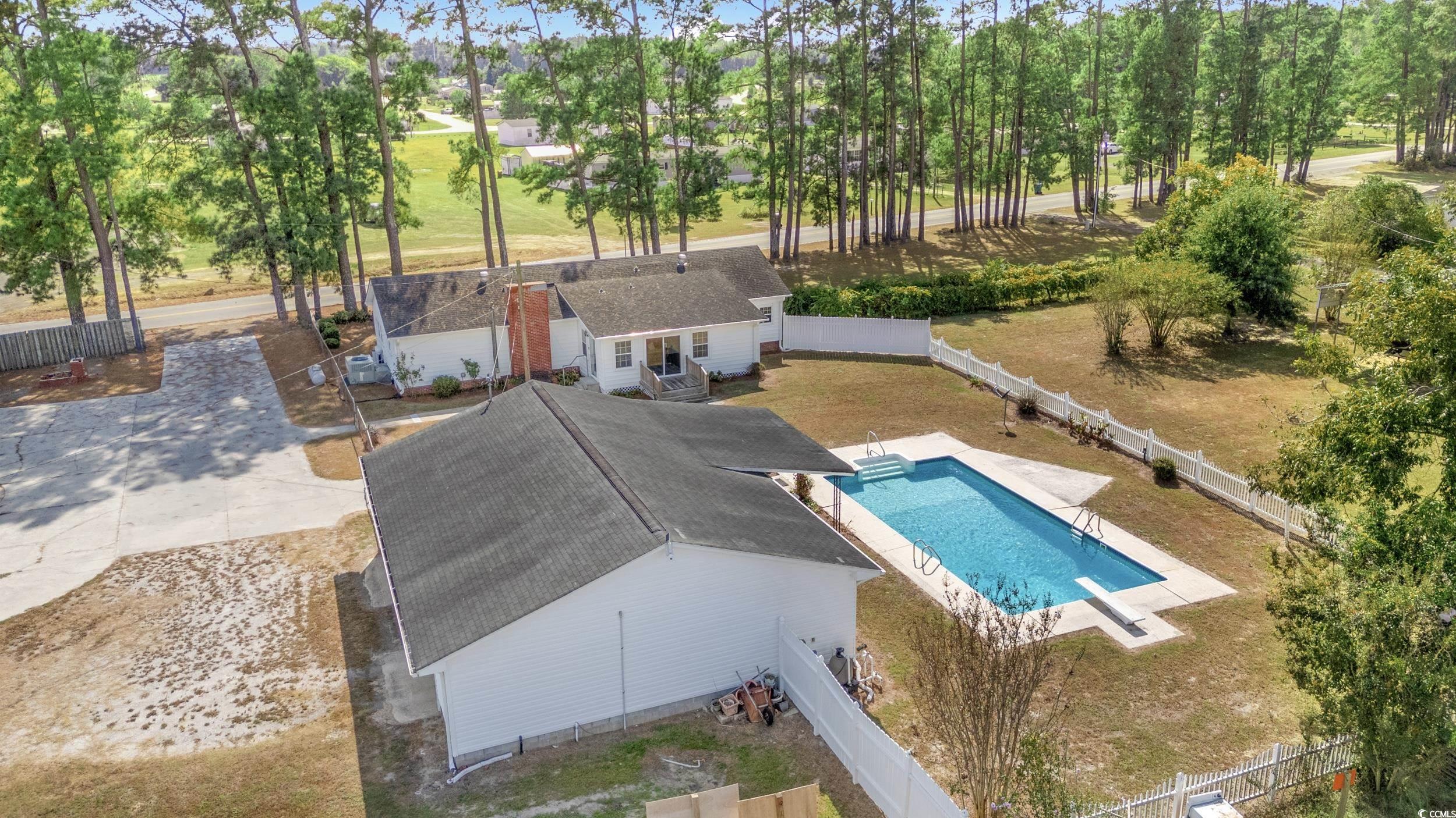 4422 Grady Road Mullins, SC 29574 - Photo 26 of 28 View from above of property with a pool area