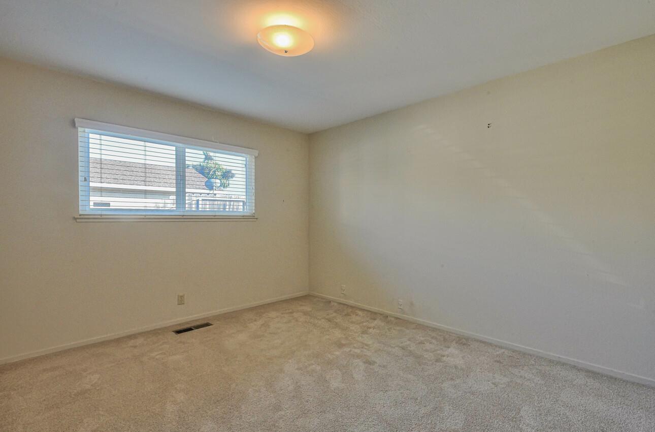 561 Palma Drive Salinas, CA 93901 - Photo 20 of 25 an empty room with windows