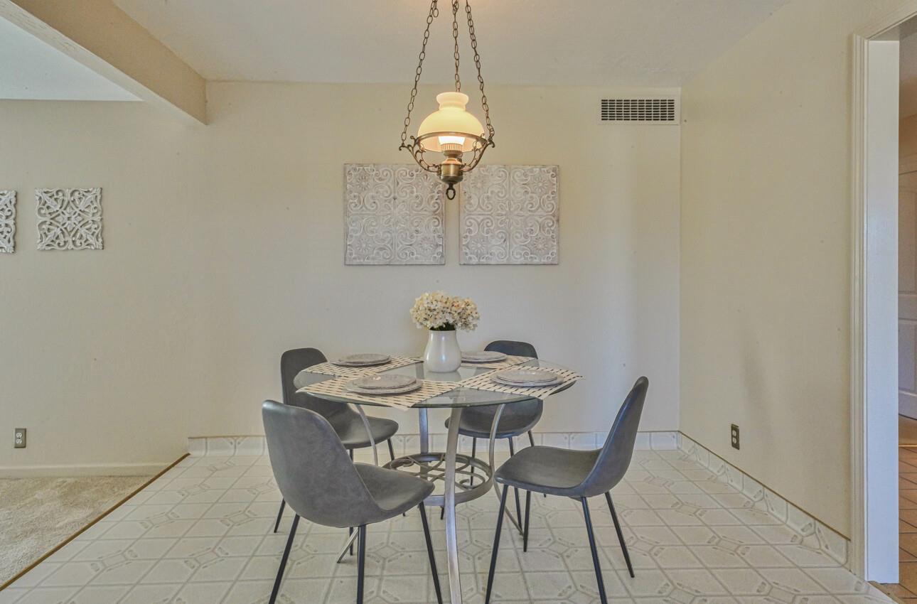 561 Palma Drive Salinas, CA 93901 - Photo 8 of 25 a view of a dining room with furniture and wooden floor