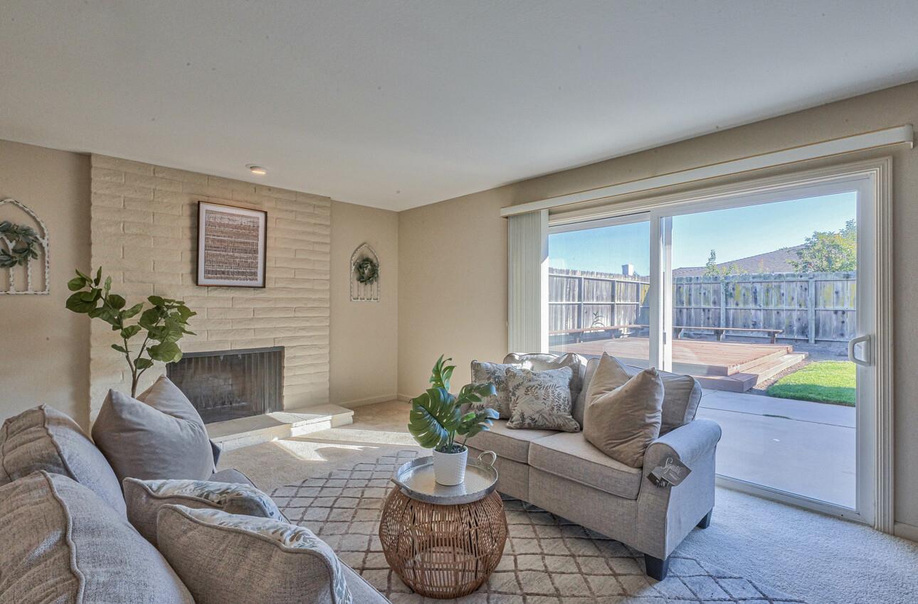 561 Palma Drive Salinas, CA 93901 - Photo 10 of 25 a living room with furniture and a fireplace