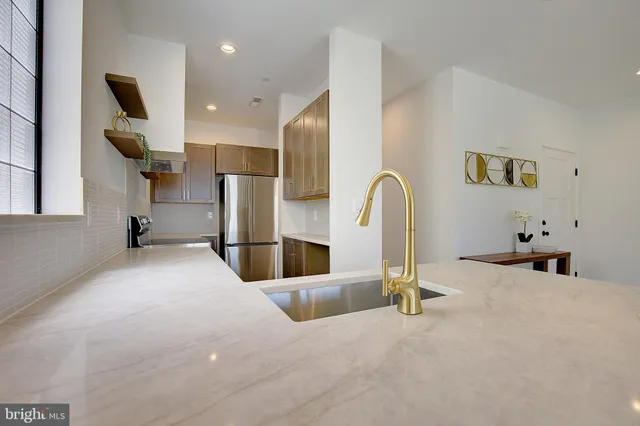 a room with gym equipment and a large window