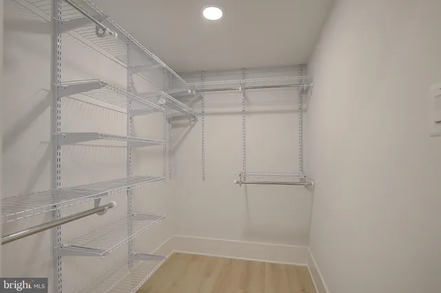 a view of a room with racks on the wall