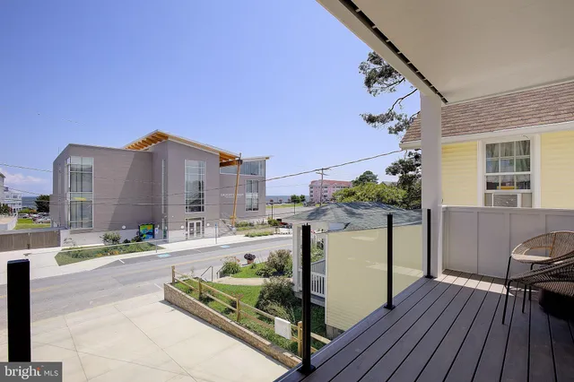 a terrace with a table and chairs
