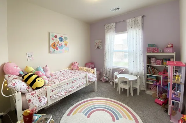 a bedroom with a bed and a book shelf