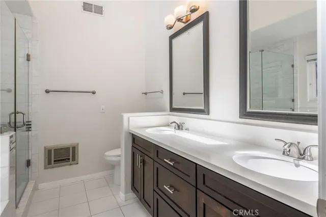 a view of a hallway with washer and dryer
