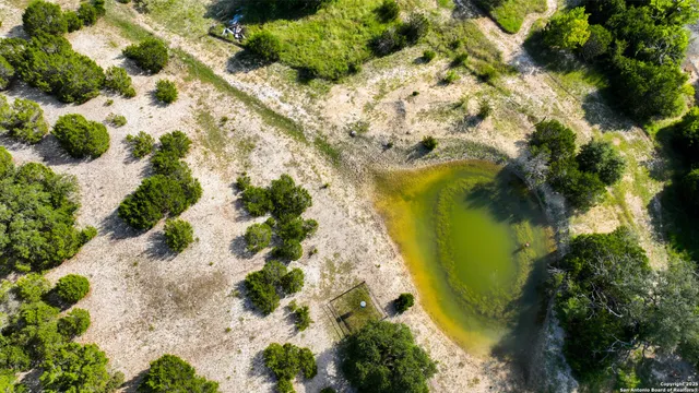 an aerial view of residential houses with city view and city view