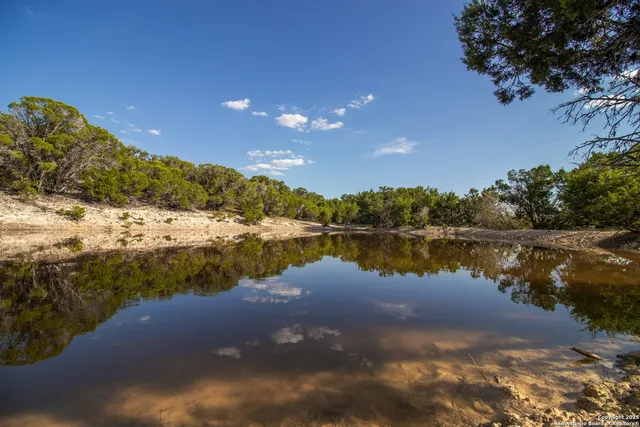 a view of swimming pool with lounge chair