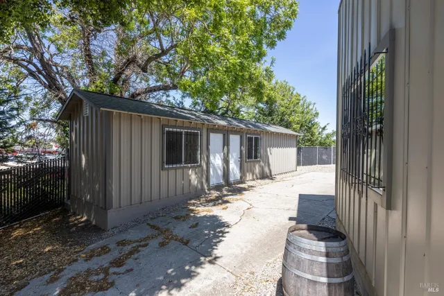 a front view of a house with a yard outdoor seating and yard