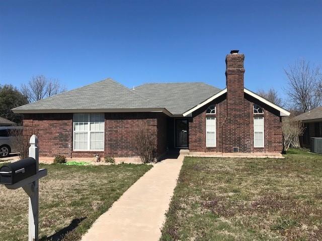 1502 Weavers Way Abilene, TX 79602 - Photo 1 of 1 a front view of a house with a yard and garage