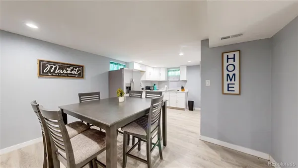 a view of a dining room with furniture