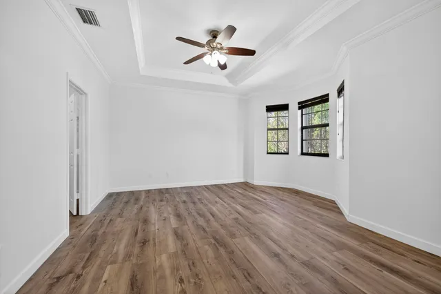 a bathroom with a double vanity sink mirror and shower