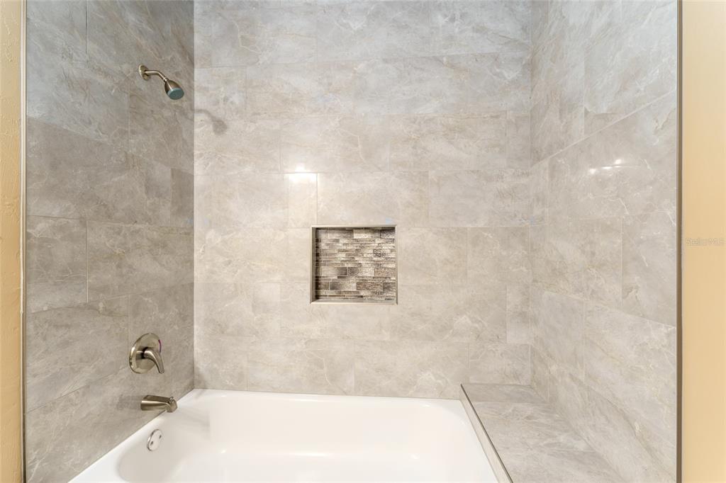 1788 Southwest 67th Circle Gainesville, FL 32607 - Photo 26 of 49 a bathroom with a bathtub