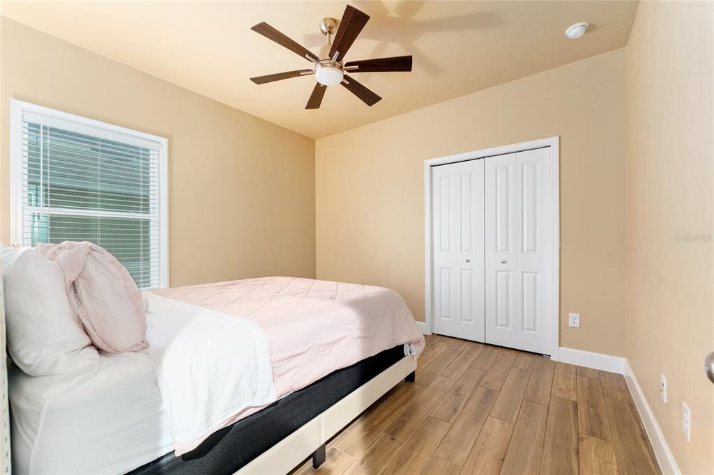 1788 Southwest 67th Circle Gainesville, FL 32607 - Photo 28 of 49 a bedroom with a bed and a window