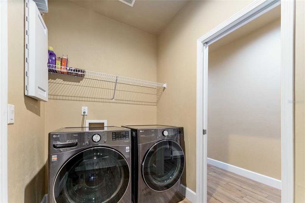 1788 Southwest 67th Circle Gainesville, FL 32607 - Photo 41 of 49 a utility room with dryer and washer