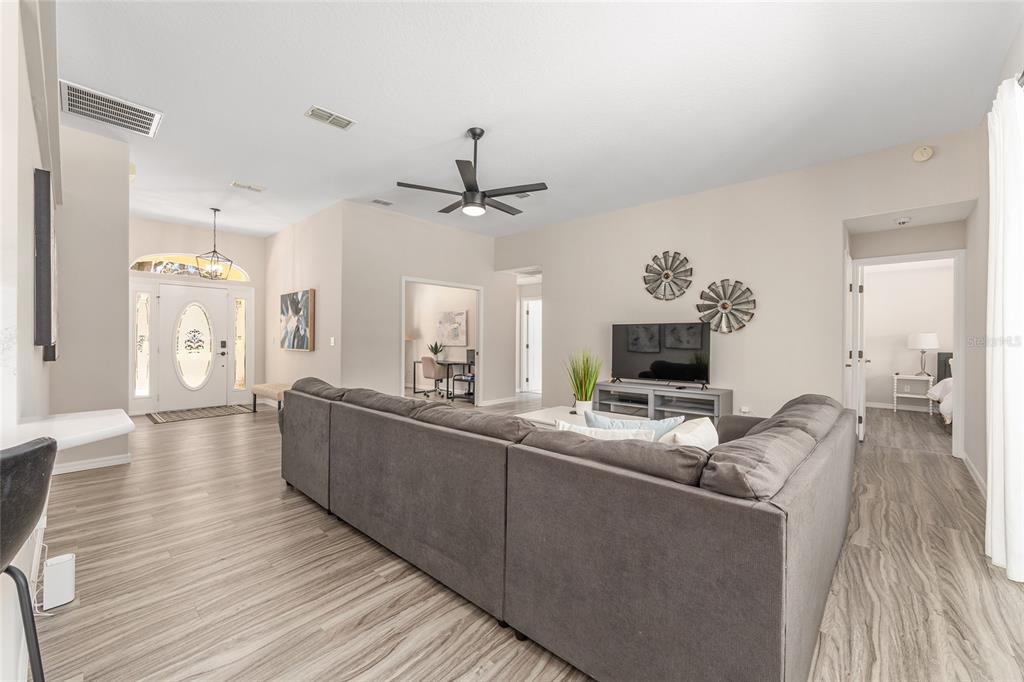 5248 Northwest 82nd Court Ocala, FL 34482 - Photo 15 of 73 a living room with furniture and a fireplace