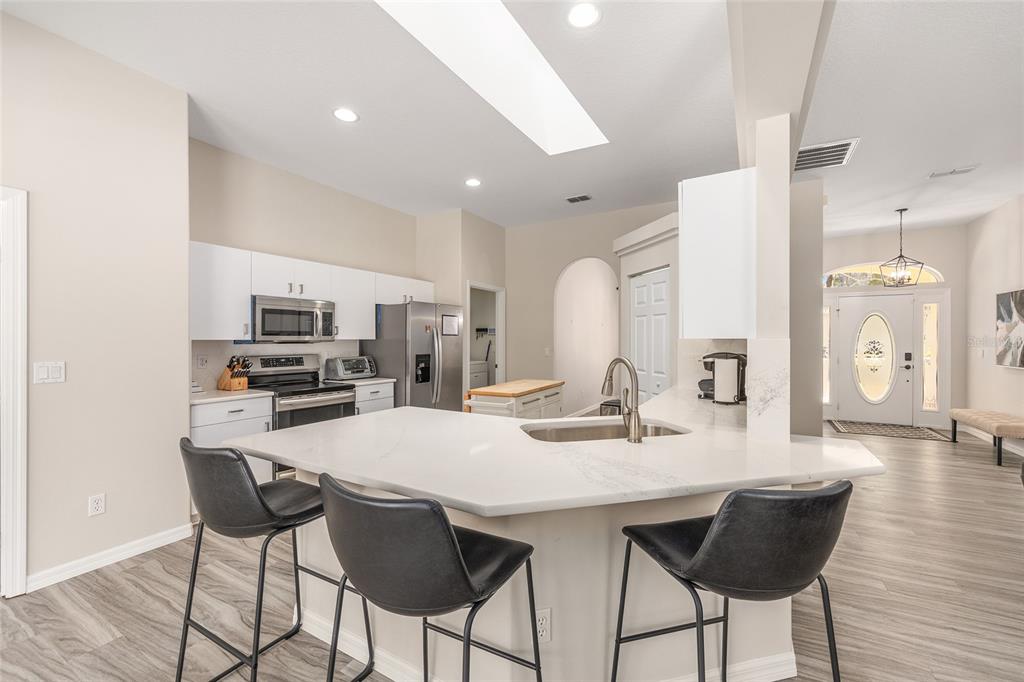 5248 Northwest 82nd Court Ocala, FL 34482 - Photo 18 of 73 a view of a dining room with furniture