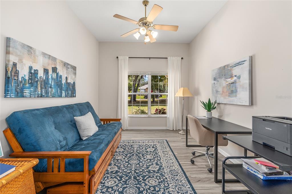 5248 Northwest 82nd Court Ocala, FL 34482 - Photo 27 of 73 a living room with furniture and a window