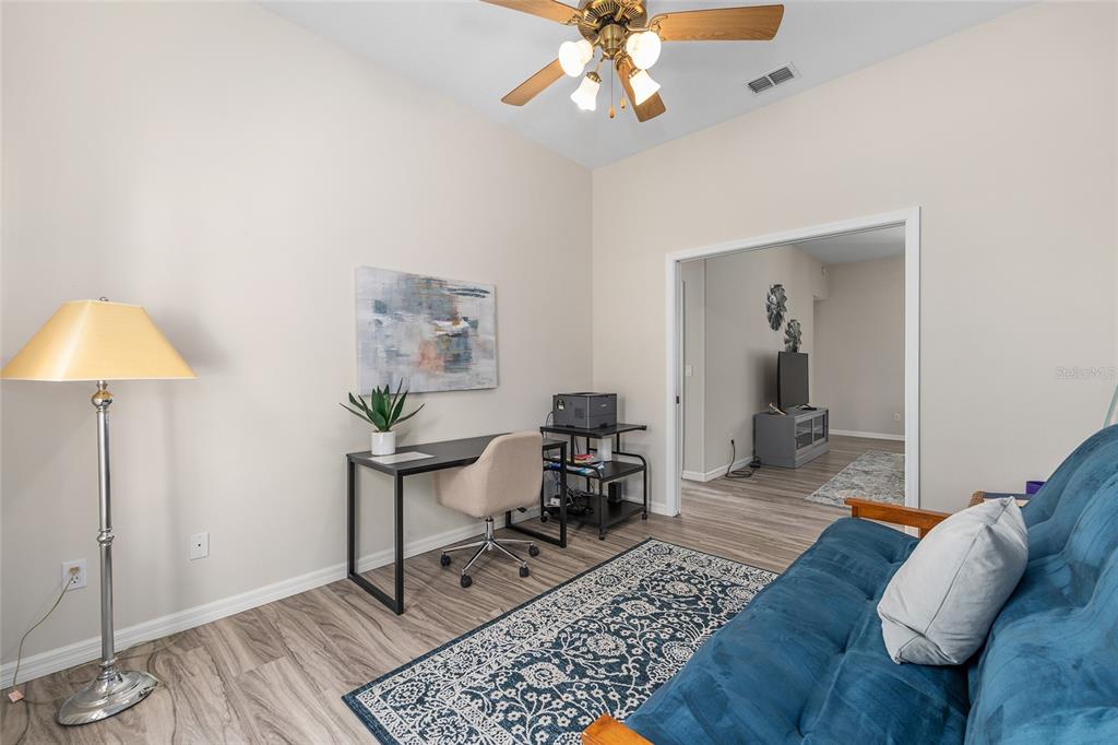 5248 Northwest 82nd Court Ocala, FL 34482 - Photo 28 of 73 a living room with furniture and a rug