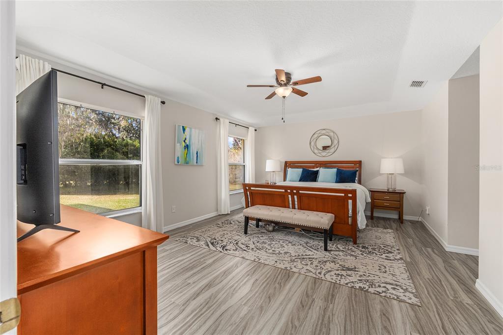 5248 Northwest 82nd Court Ocala, FL 34482 - Photo 29 of 73 a living room with furniture and wooden floor