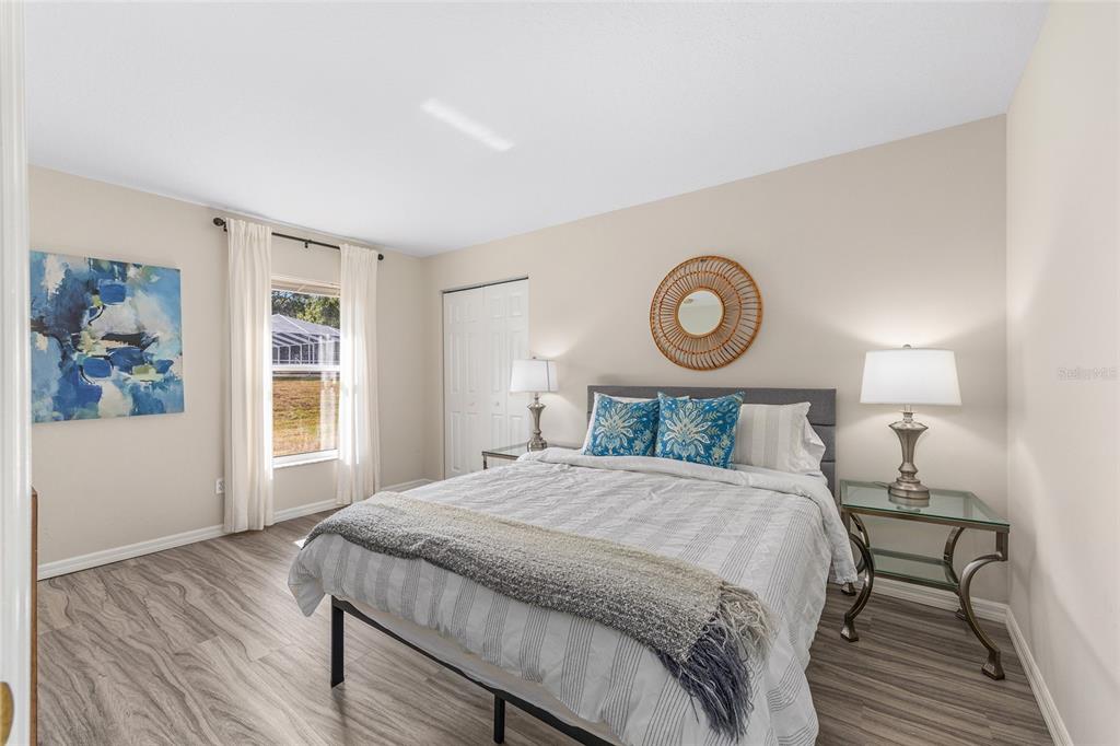 5248 Northwest 82nd Court Ocala, FL 34482 - Photo 36 of 73 a bedroom with a bed and a window