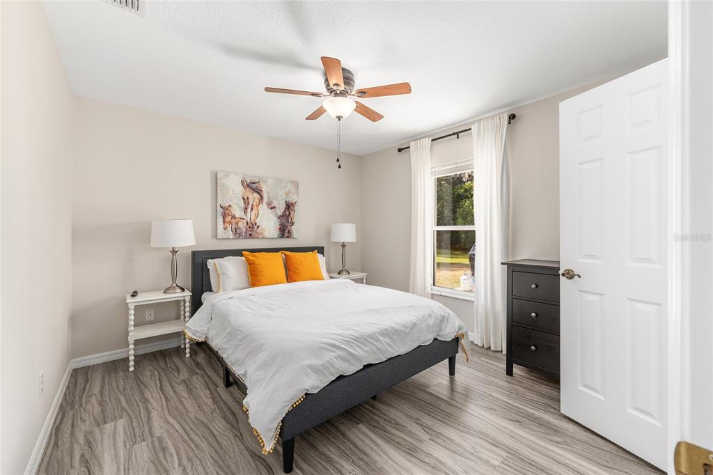 5248 Northwest 82nd Court Ocala, FL 34482 - Photo 41 of 73 a bedroom with a bed and a window