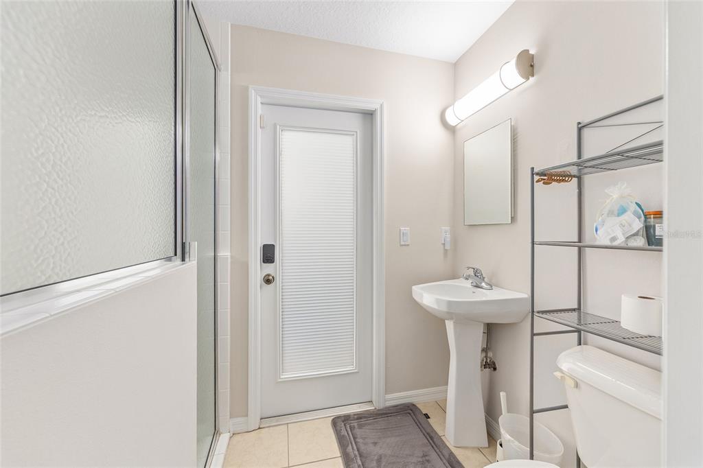 5248 Northwest 82nd Court Ocala, FL 34482 - Photo 43 of 73 a bathroom with a sink a toilet and shower