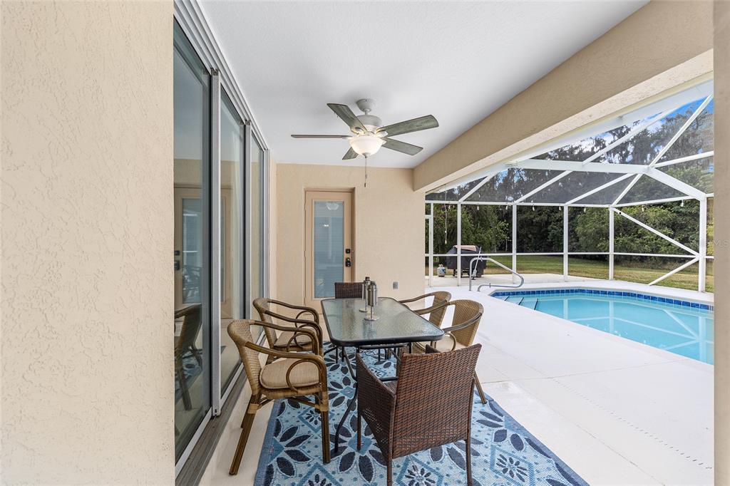 5248 Northwest 82nd Court Ocala, FL 34482 - Photo 47 of 73 a dining room with furniture window and wooden floor