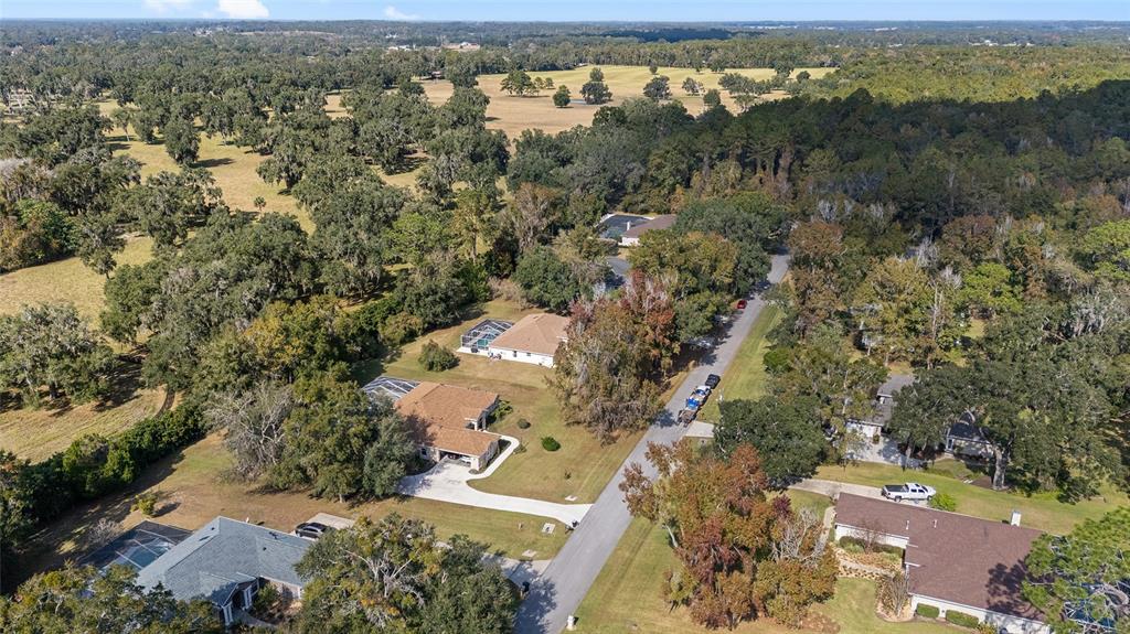 5248 Northwest 82nd Court Ocala, FL 34482 - Photo 65 of 73 an aerial view of a city with lots of residential buildings