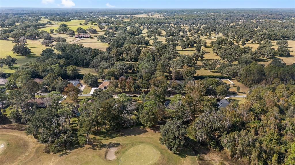 5248 Northwest 82nd Court Ocala, FL 34482 - Photo 66 of 73 an aerial view of residential houses with outdoor space