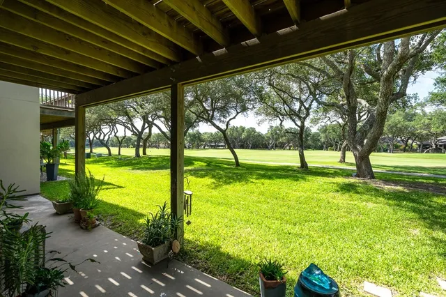 a view of yard with swimming pool