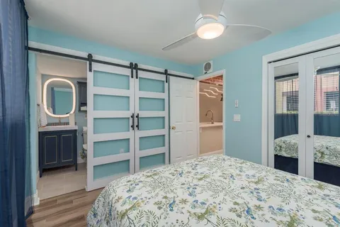 a bathroom with a toilet a sink and shower