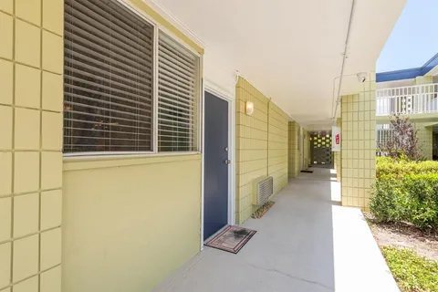 a workspace with furniture and a window