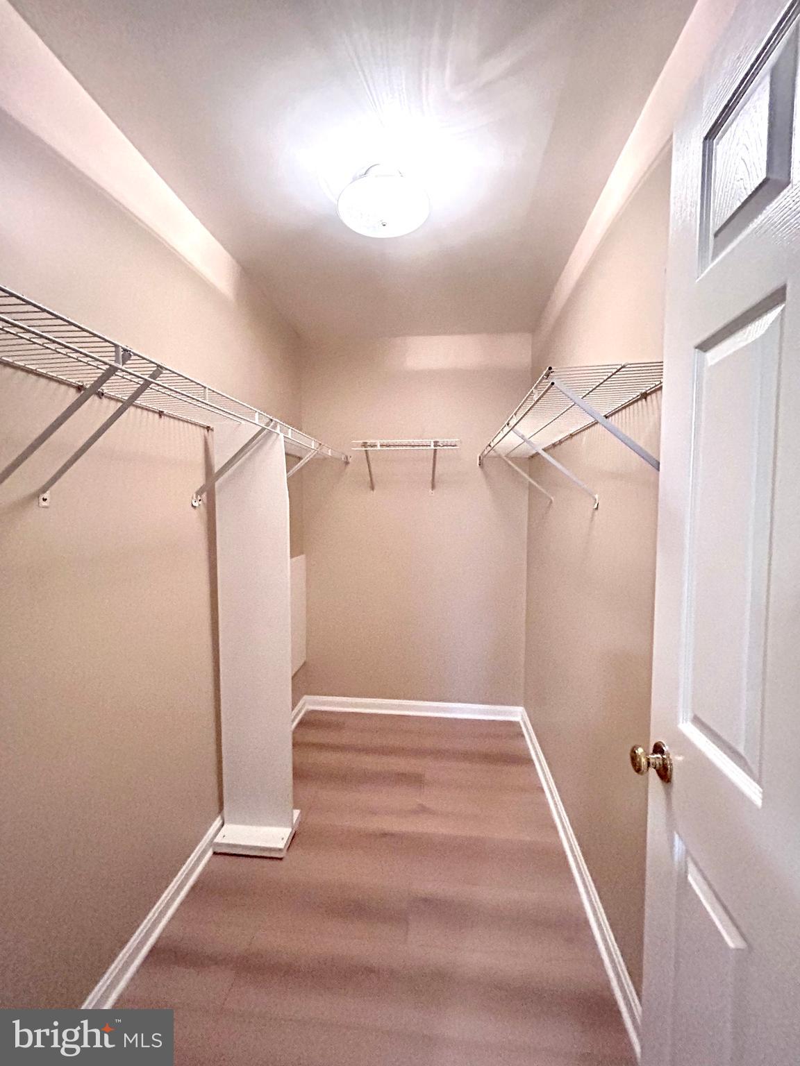 1024 Gardenview Loop, Unit 102 Woodbridge, VA 22191 - Photo 16 of 23 Master bedroom walk-in Closet