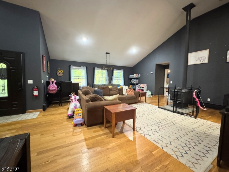 11 Hirams Grove Road Branchville, NJ 07826 - Photo 11 of 50 a living room with furniture a dining table and chairs