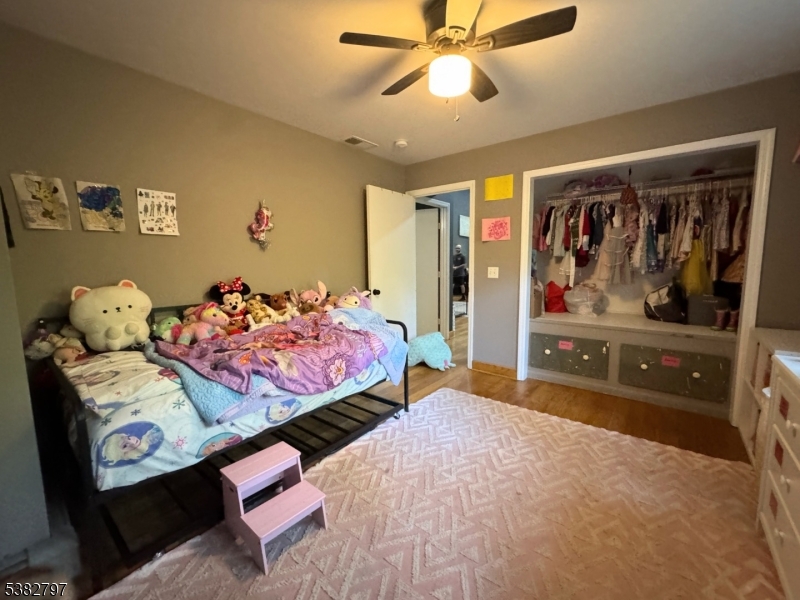 11 Hirams Grove Road Branchville, NJ 07826 - Photo 16 of 50 a bedroom with a bed and wooden floor