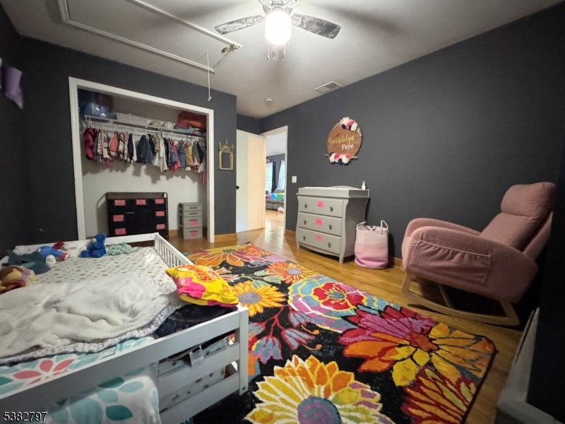 11 Hirams Grove Road Branchville, NJ 07826 - Photo 22 of 50 a bedroom with bed and a fireplace