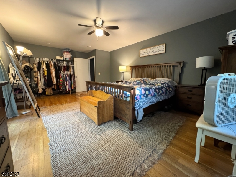 11 Hirams Grove Road Branchville, NJ 07826 - Photo 25 of 50 a bed room with a bed and a chair