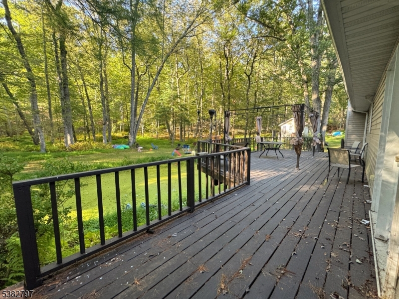 11 Hirams Grove Road Branchville, NJ 07826 - Photo 33 of 50 a view of a wooden deck with a yard