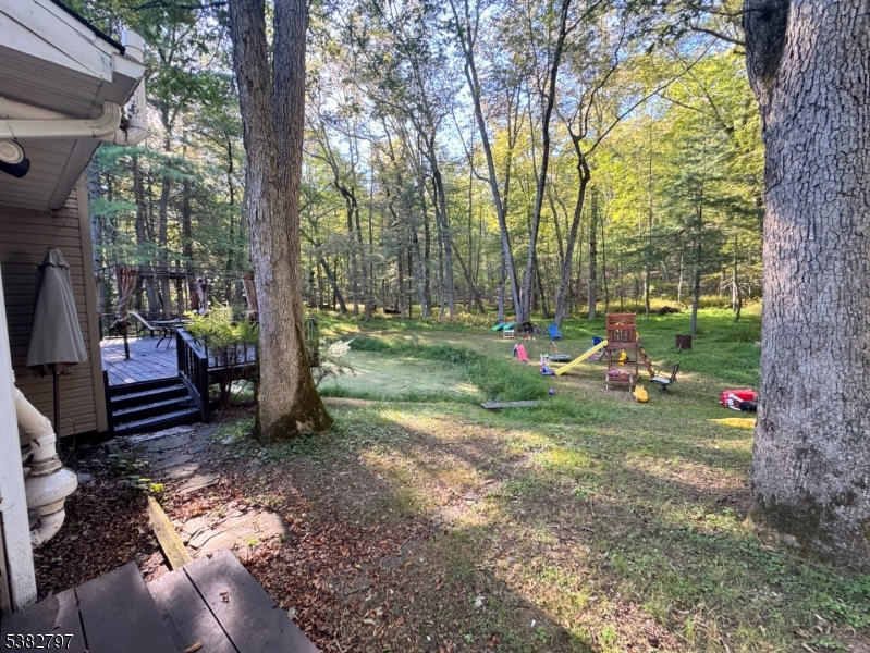 11 Hirams Grove Road Branchville, NJ 07826 - Photo 33 of 50 a view of a park with large trees and a fire pit