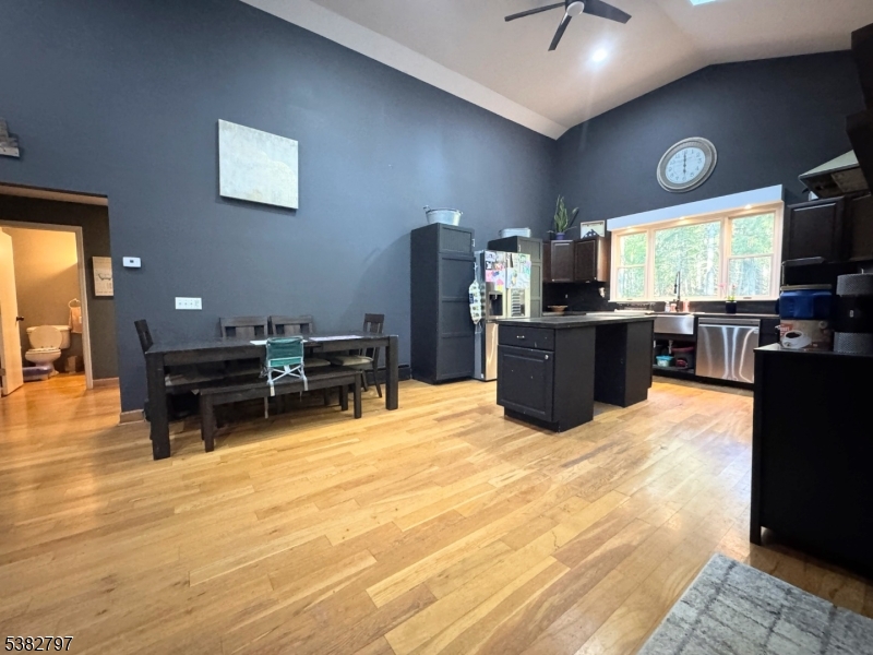 11 Hirams Grove Road Branchville, NJ 07826 - Photo 4 of 50 a kitchen with furniture and a flat screen tv