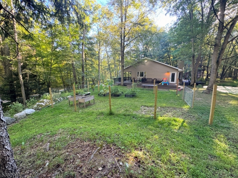 11 Hirams Grove Road Branchville, NJ 07826 - Photo 45 of 50 a backyard of a house with lots of green space