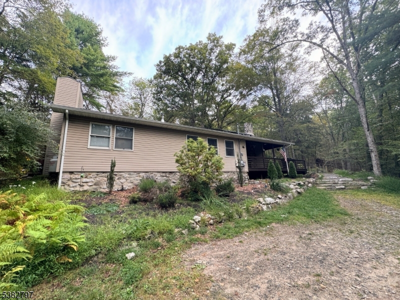 11 Hirams Grove Road Branchville, NJ 07826 - Photo 49 of 50 a backyard of a house with seating space