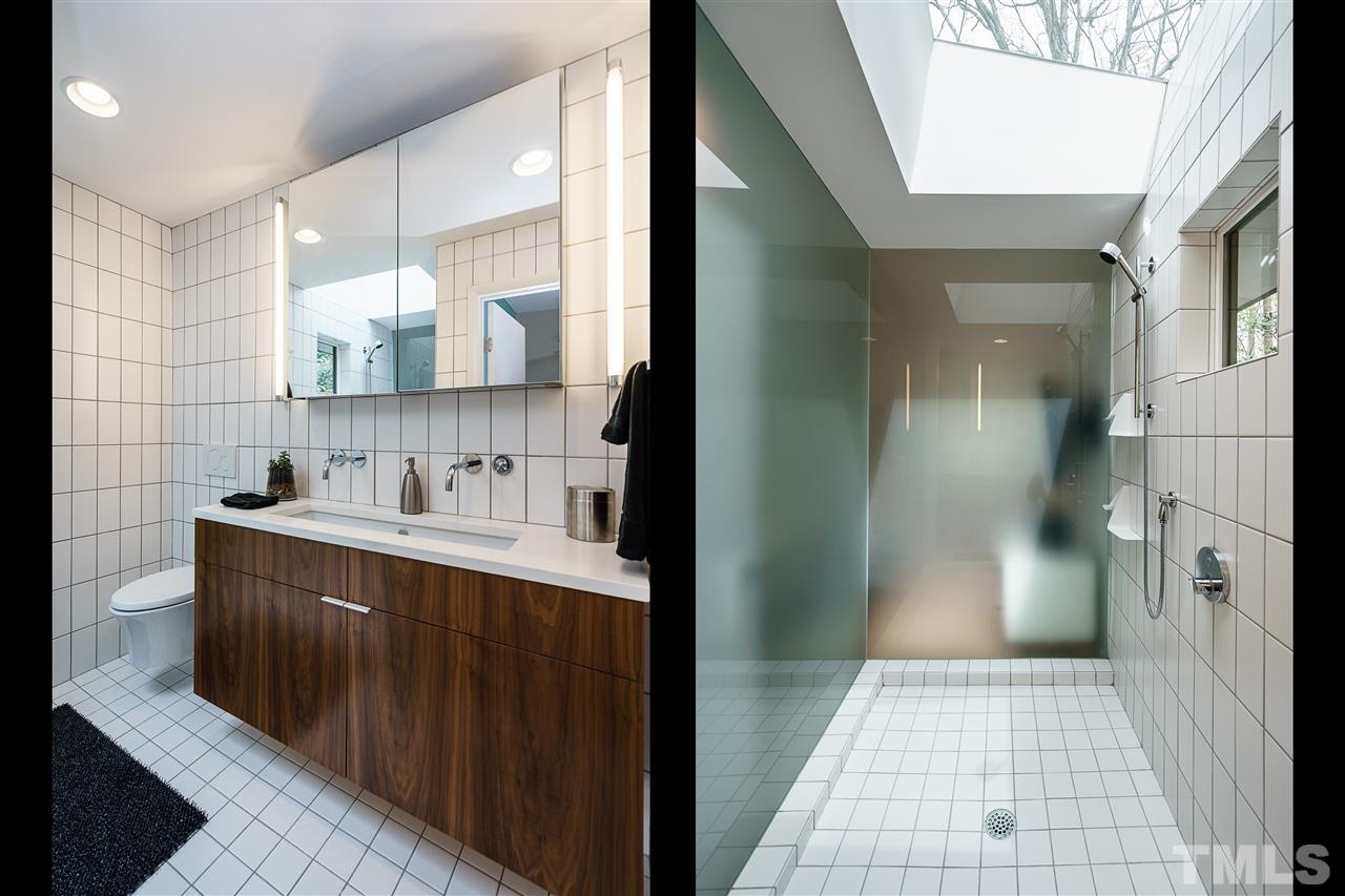 3322 Ocotea Street Raleigh, NC 27607 - Photo 15 of 25 a bathroom with a sink a toilet and shower