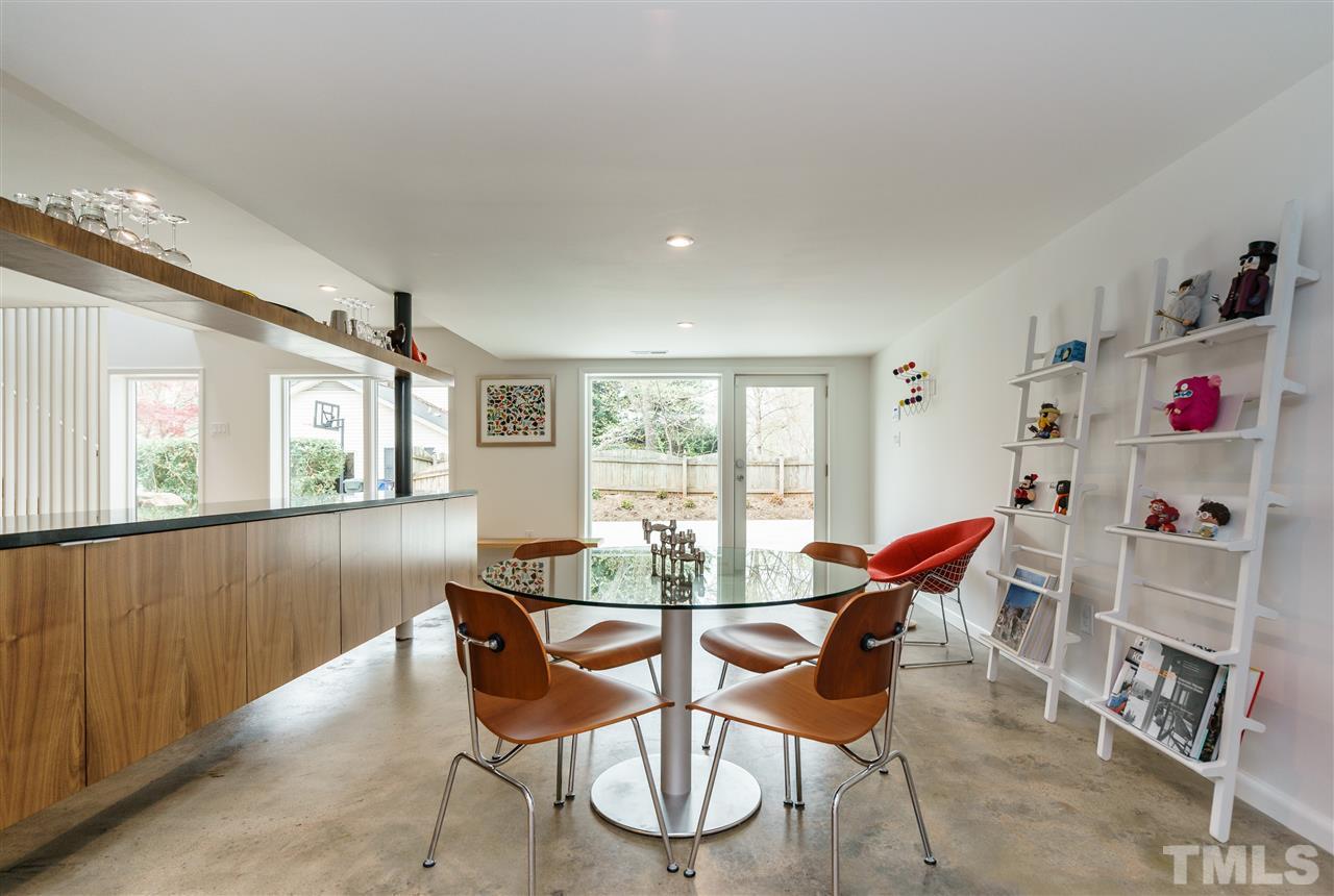 3322 Ocotea Street Raleigh, NC 27607 - Photo 18 of 25 a dining room with furniture and window